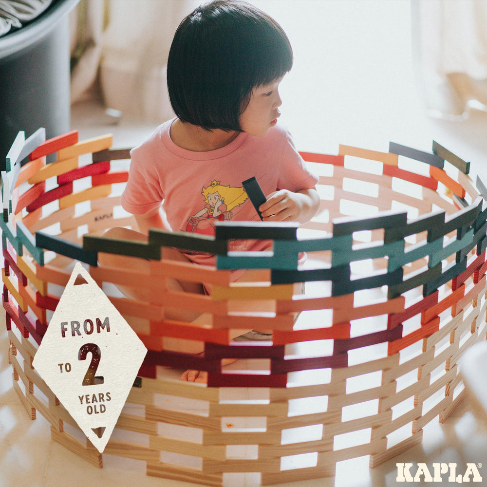 KAPLA box compartments organize colors for quick building sessions.
