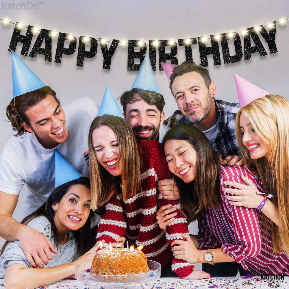 KatchOn Glitter Black Happy Birthday banner spans 10 feet, covering large wall space.
