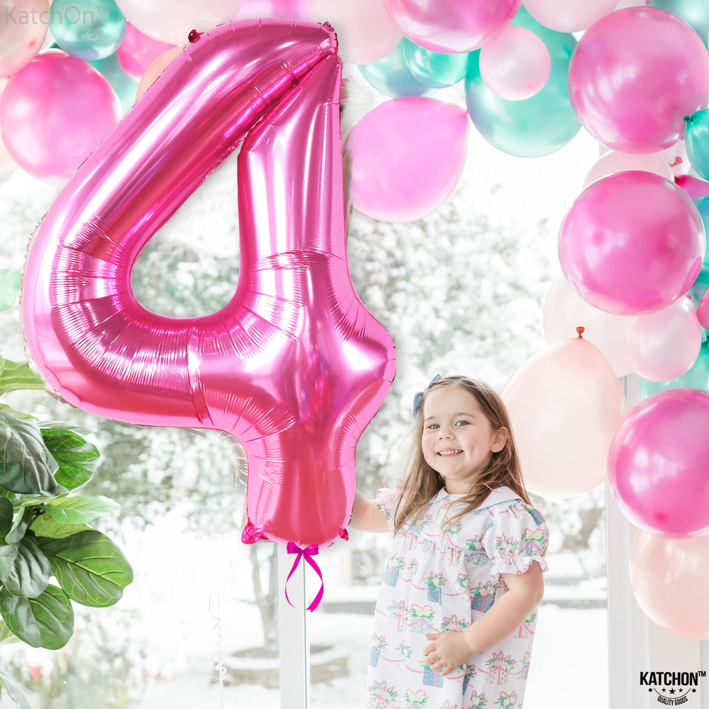 KatchOn pink number 4 balloon pairs with other pink decorations for cohesion