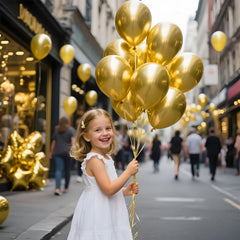KAWKALSH balloons creating a shimmering arch for wedding decor