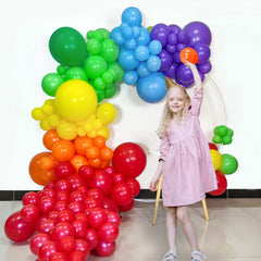 KAWKALSH party decor idea with gold latex balloons.