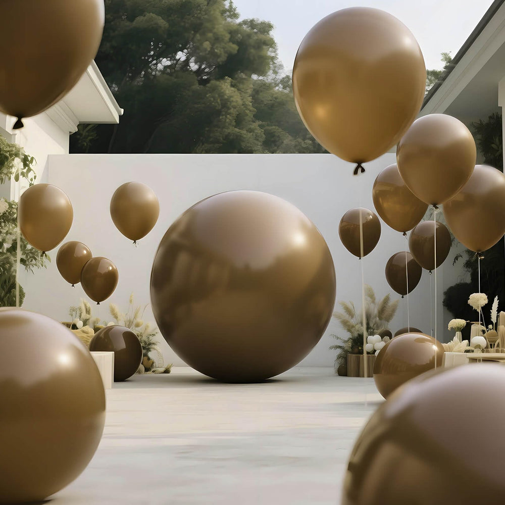 KAWKALSH brown-toned balloon wall adds depth to event decor.