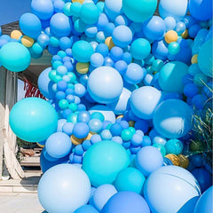 KAWKALSH blue balloons add subtle elegance to wedding decor.