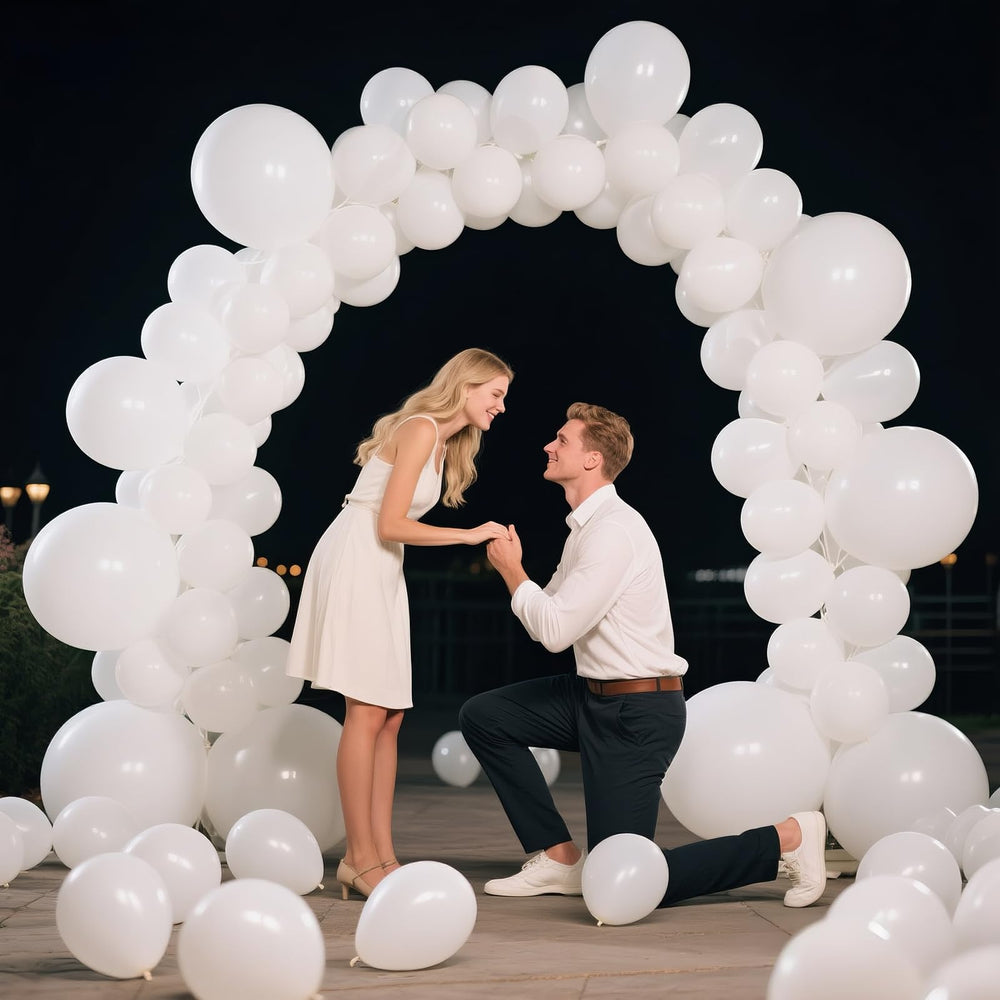 Backdrops and photo moments enhanced by KAWKALSH white balloons.