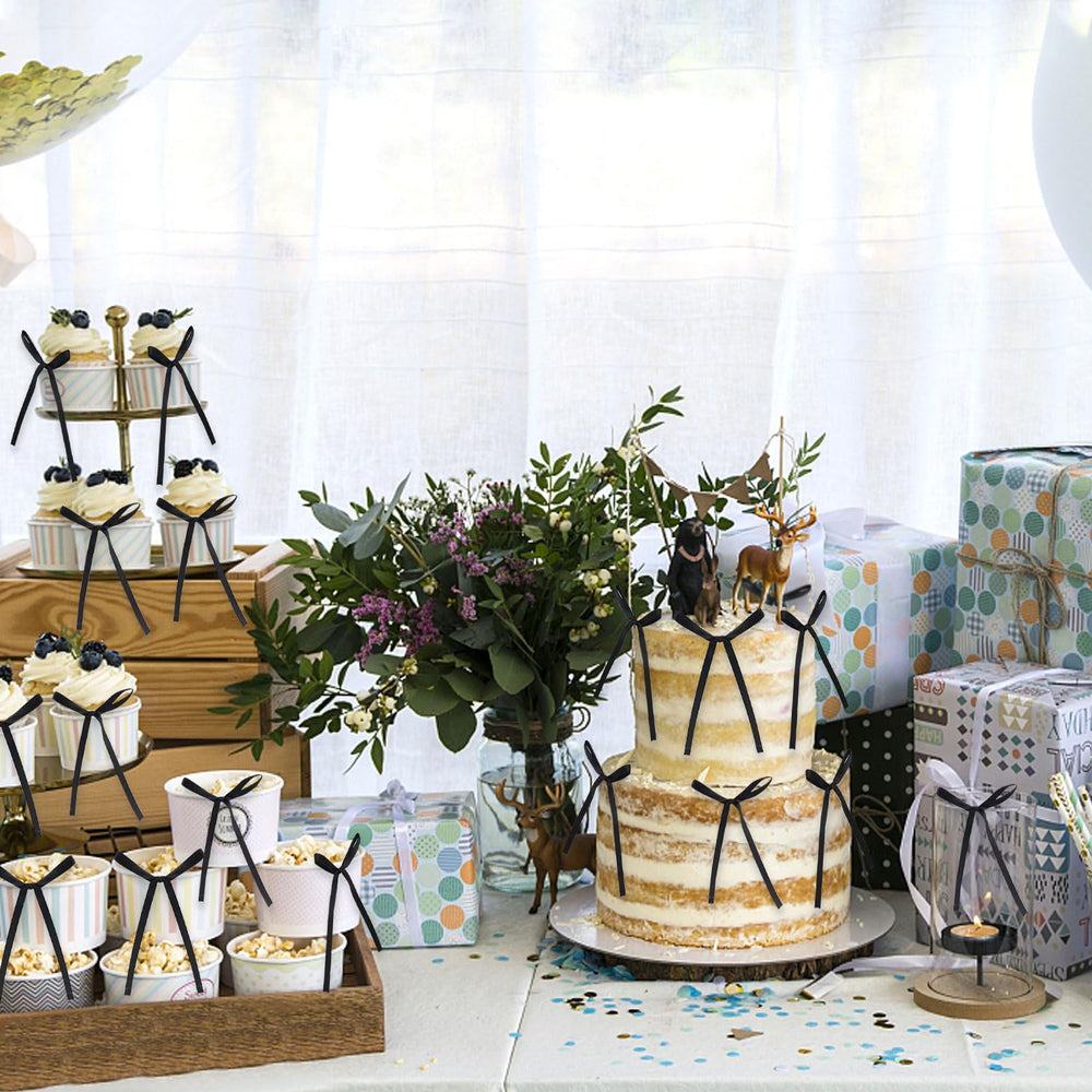 Keaziu high-footed cup decor with black bow adds height.