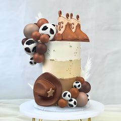 KEEPARTY second cowboy boot topper complements themed cake displays for parties.