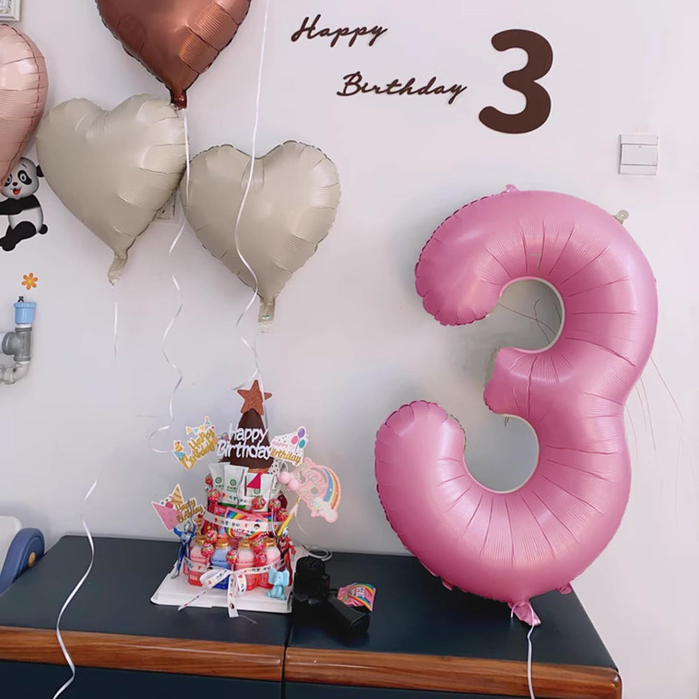 Kelfuoya 40-inch pink number 30 balloon enhances wedding anniversary decor.