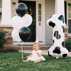 Kelfuoya cow-print number 1 balloon inflates easily with straw, quick setup.
