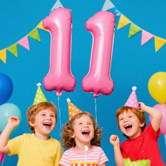 Kelfuoya pink foil 11 birthday balloon creates a glamorous backdrop.