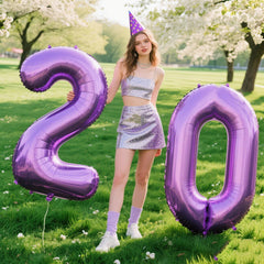 Kelfuoya purple foil balloon used as photography backdrop for celebrations.