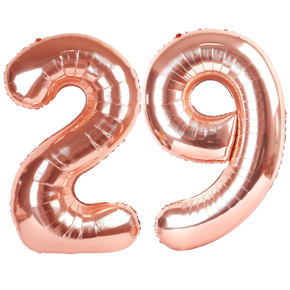 Kelfuoya 40-inch rose gold 29 balloon creates a glamorous milestone backdrop.