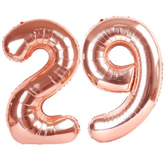 Kelfuoya 40-inch rose gold 29 balloon creates a glamorous milestone backdrop.