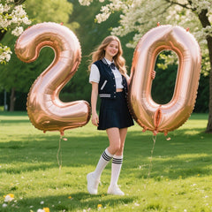 Kelfuoya rose gold 40-inch balloon being inflated with straw for quick prep