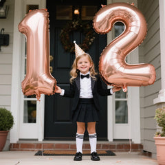 Kelfuoya rose gold foil 12-balloon wall display enhances photos and memories.