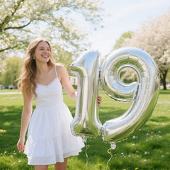 Kelfuoya silver number 9 balloon used in a birthday party set
