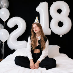 Kelfuoya white number 18 foil balloon enhances birthday decor with elegance.