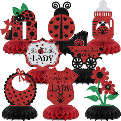 KEWUFD ladybug honeycomb centerpiece on a cake for a baby shower