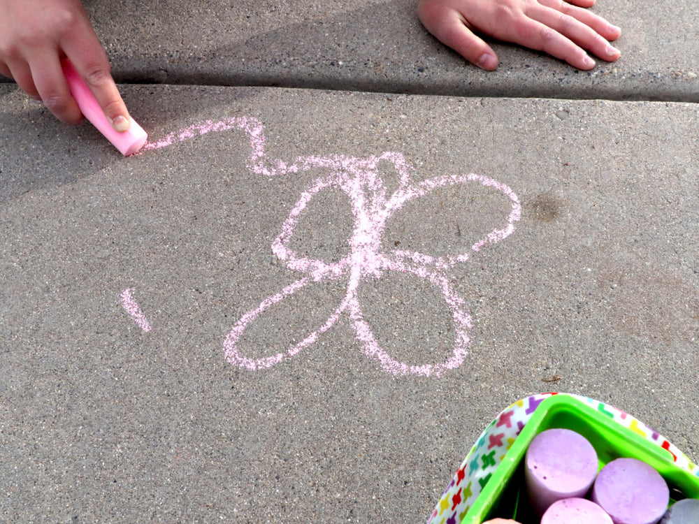 Non-toxic chalk set supports safe outdoor art.