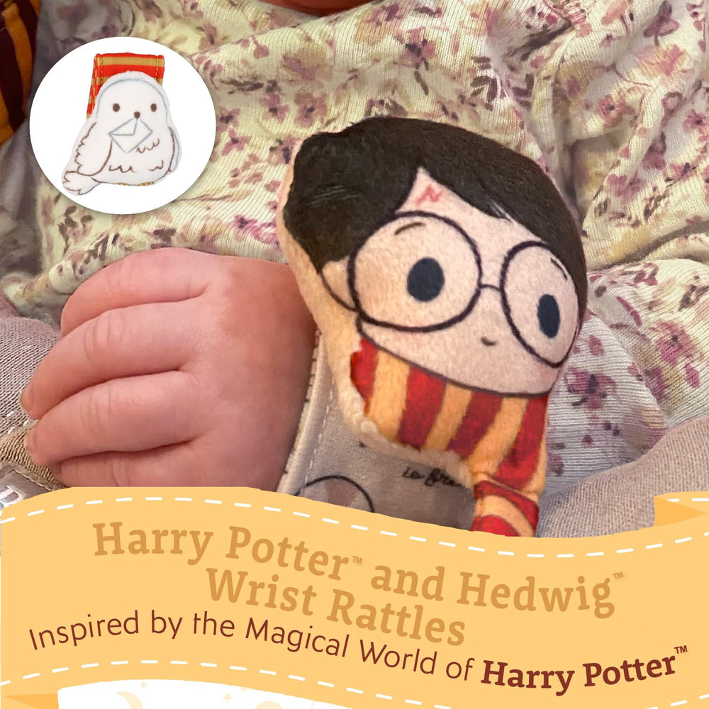 Close-up of Hedwig plush rattle showing ultra-soft fabric for soothing touch