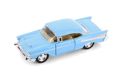 KiNSMART 1957 Chevy Bel Air Coupe 5in die-cast body with authentic display detailing.