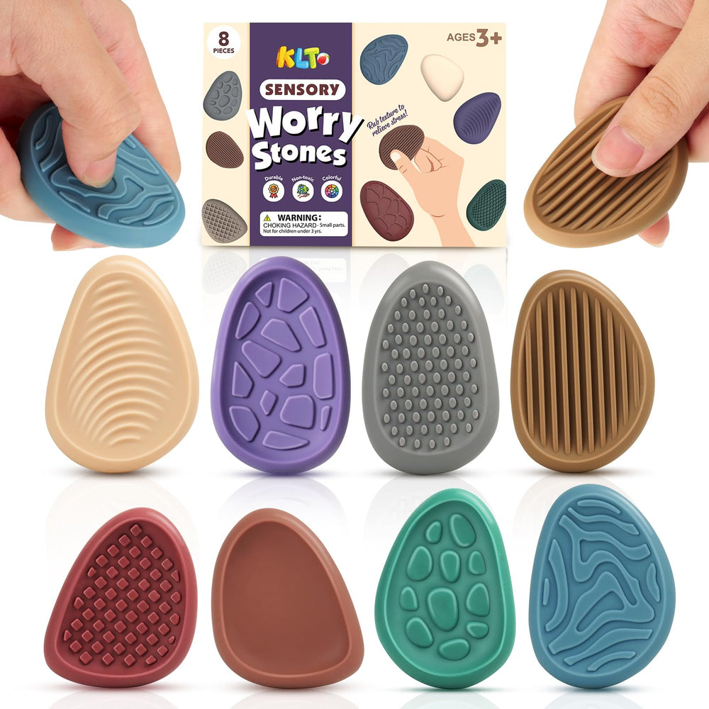 KLT fidget stones 8-pack held in hand for focus and calm.