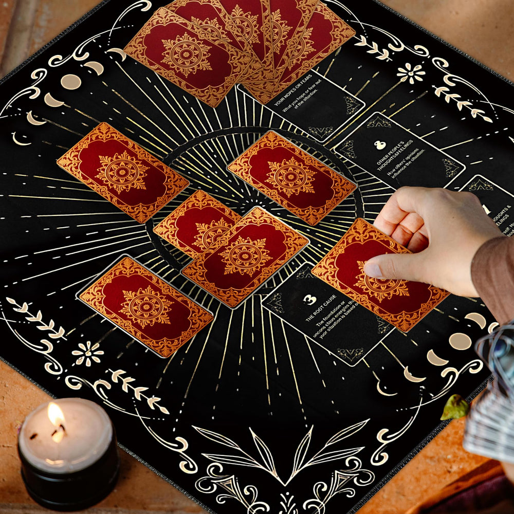 Knana black cloth frames cards and enhances visual focus during divination.