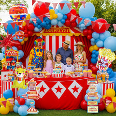 Kozee striped tablecloth complements decor for a cohesive carnival table display.