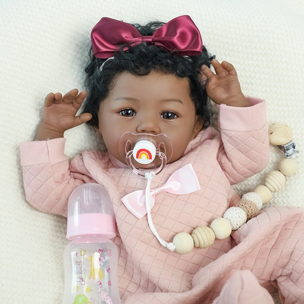 KSBD 18-inch reborn doll with mauve headband for elegant display.