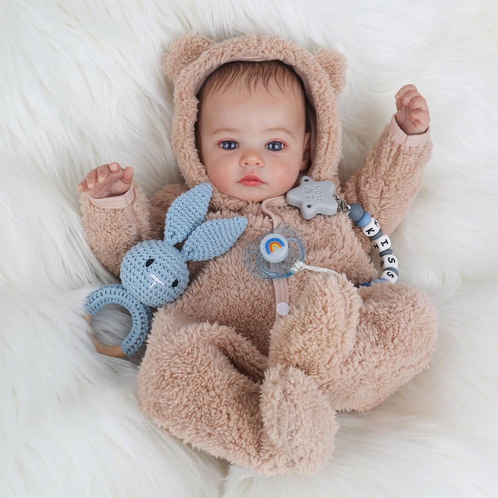 KSBD Reborn baby doll in grey onesie and hat for a complete newborn look
