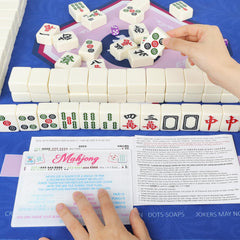 KUIRAN Mahjong Line Finder 4-pack shown with family game night setup.