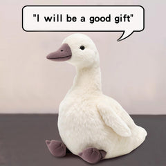 KUUDESOXX duck plush hugged by a child offers soft cuddles.