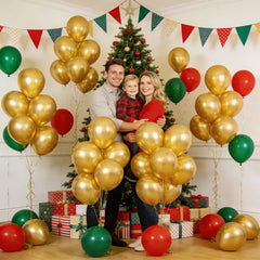 KUULBELA baby shower decor featuring shimmering metallic gold balloons.
