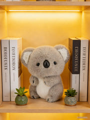 KWQBWQF koala plush 30 cm size becomes a cuddly travel buddy.