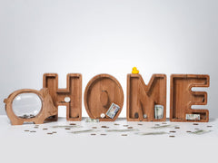 Ladenk wooden letter bank doubles as playful shelf decor.