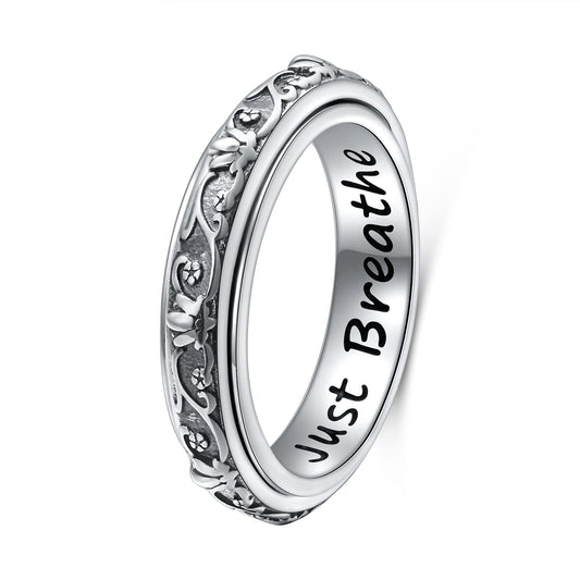 Ladytree spinner ring with lotus flower, offering subtle stress relief on the go.
