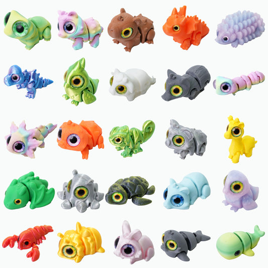 Laehovr 25PC mini animals with shining eyes for desk display and tactile focus.