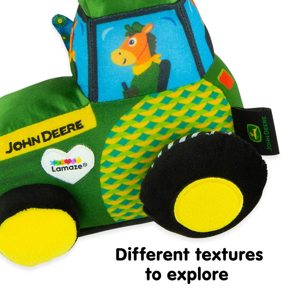 Lamaze tractor toy with a clicking wheel creates engaging sounds for auditory engagement.
