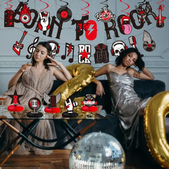 Larrazabal foil swirls Rock and Roll enhance photo booth ambiance.