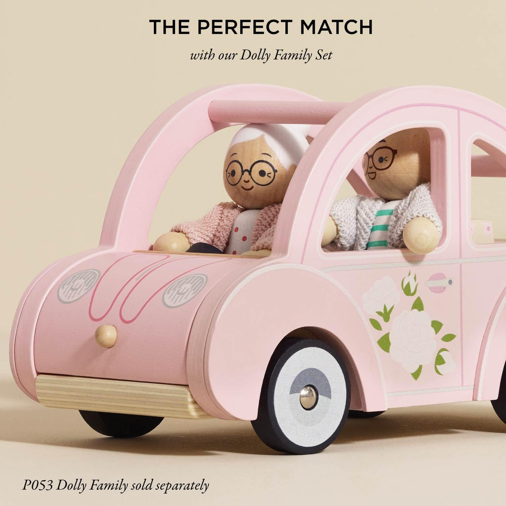 Contents include the iconic retro car and matching luggage for imaginative journeys.