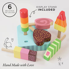 Brightly painted wooden pops on sticks from Le Toy Van Honeybake, encouraging storytelling and cooperative play.