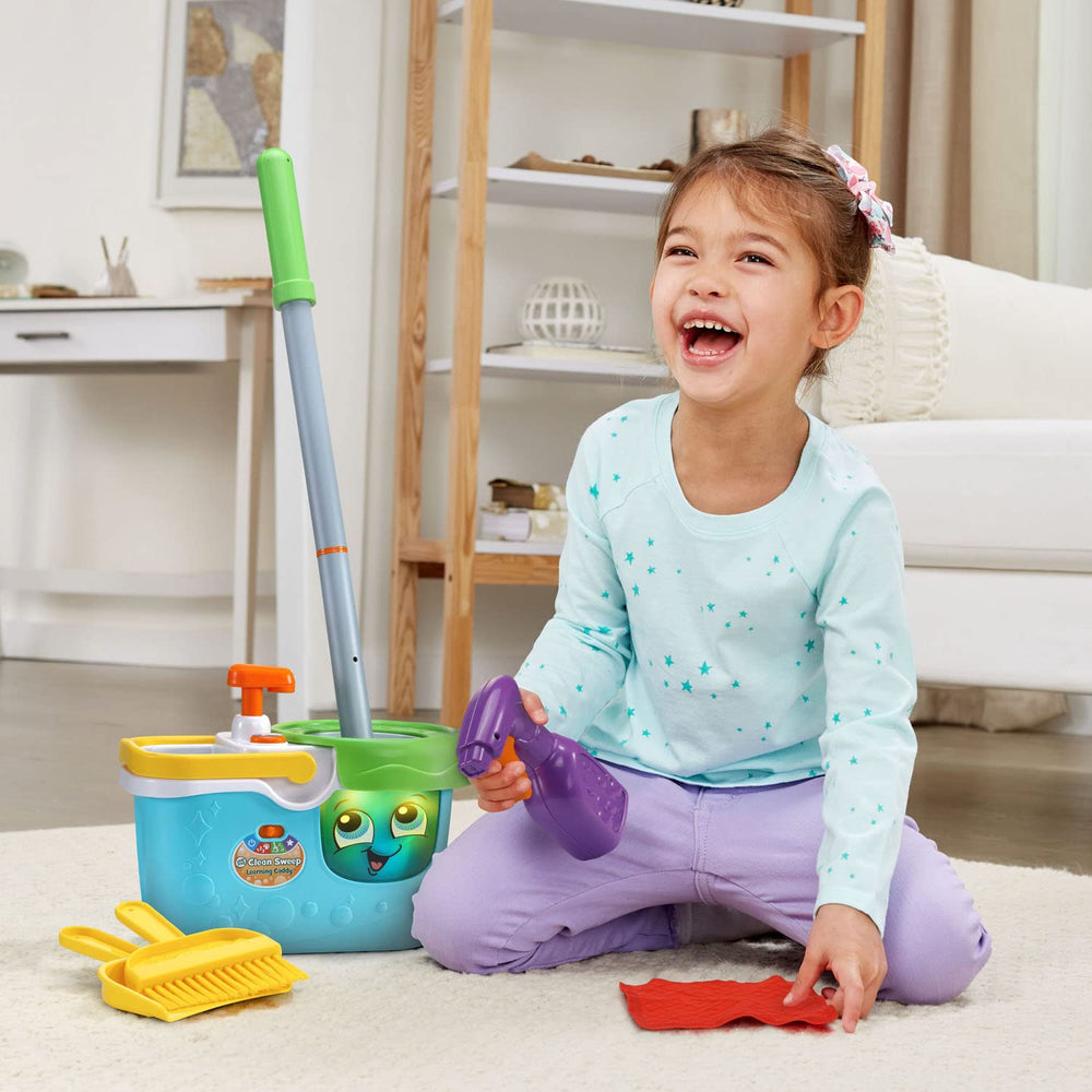 LeapFrog Clean Sweep red cloth prompts wipe-up play