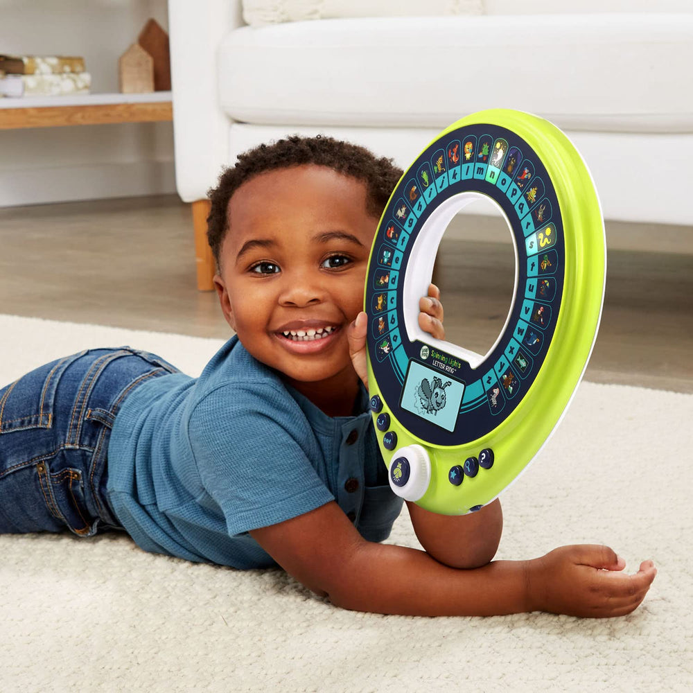 LeapFrog Spinning Lights Letter Ring uses batteries for interactive play.