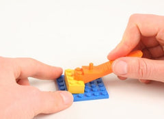 LEGO brick separator 630 in use to pull apart bricks safely