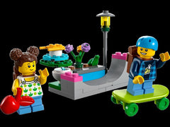 LEGO City 30588 open packaging reveals two minifigures and accessories for creative setups.