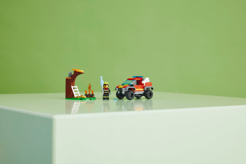 LEGO cat figure perched in a tree invites a brave rescue scenario.