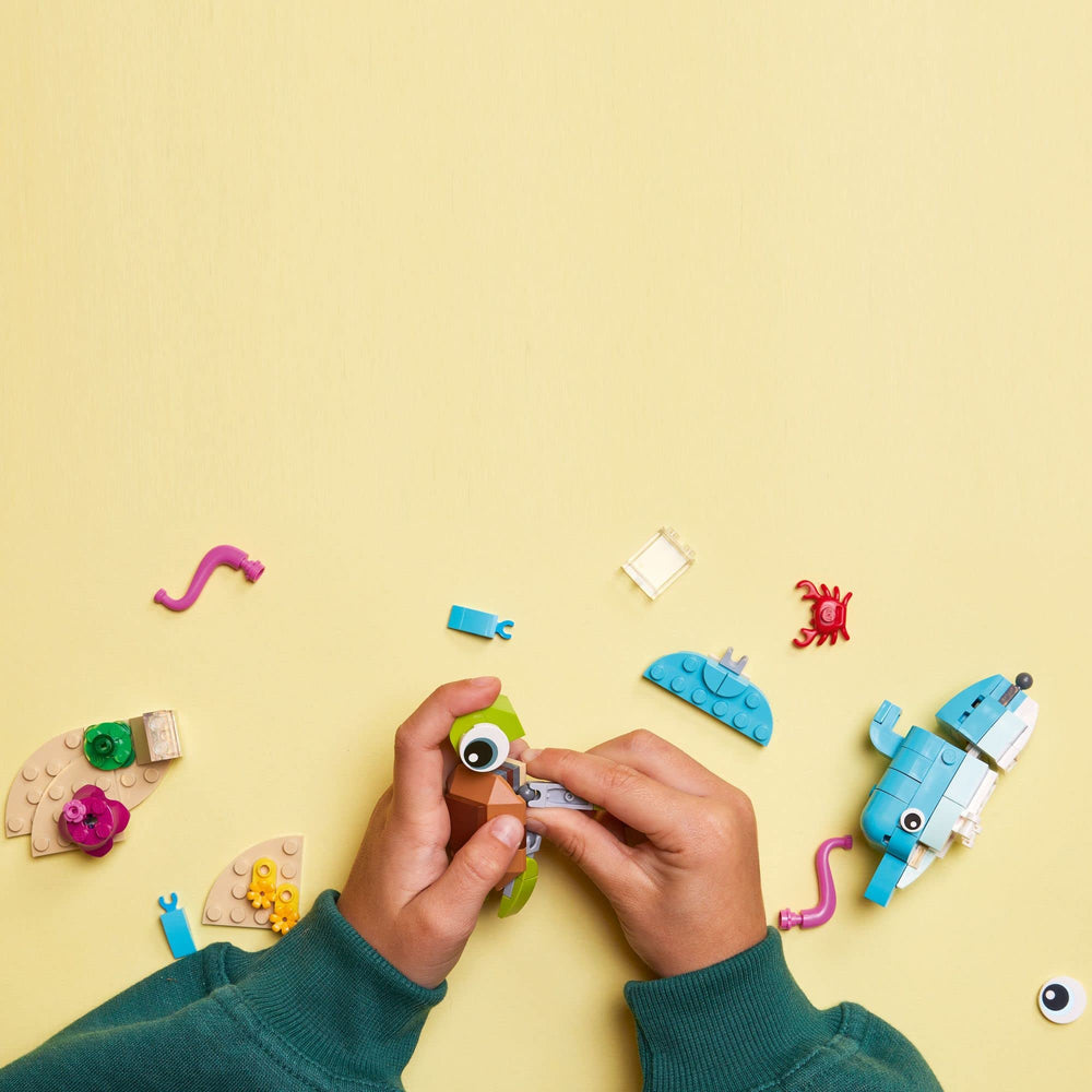 LEGO Creator 3in1 transforms Dolphin and Turtle into Seahorse and Sea Snail for play.