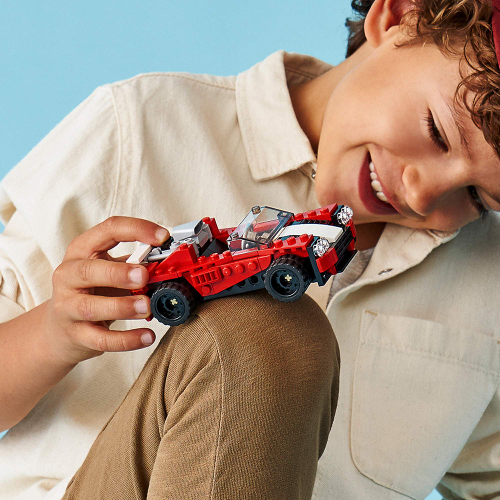 LEGO Creator 3-in-1 sports car side view highlighting compact, portable design