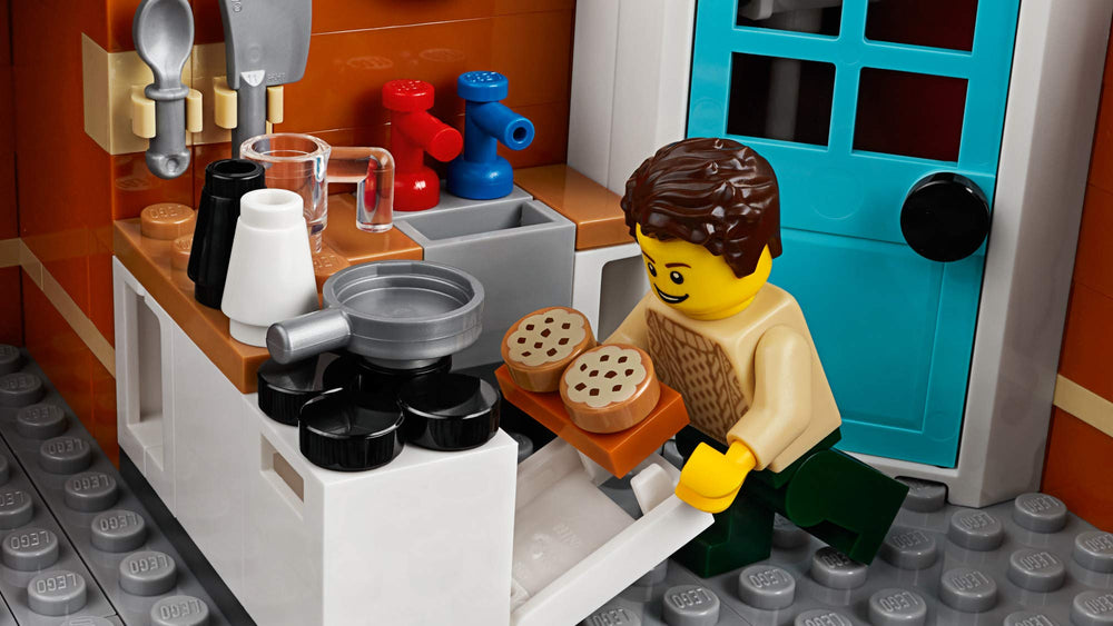 LEGO Creator Expert Corner Garage minifigures and animals diorama.