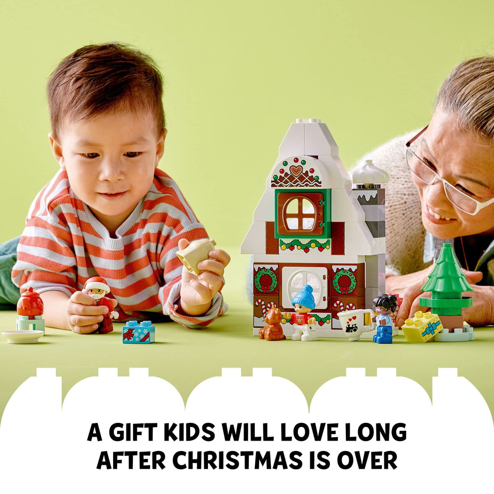 LEGO DUPLO Santa's Gingerbread House teapot and cakes support snack-time role play