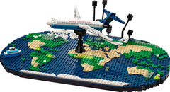 LEGO Family Holiday Memories world map and plane display inviting travel-inspired family bonding.